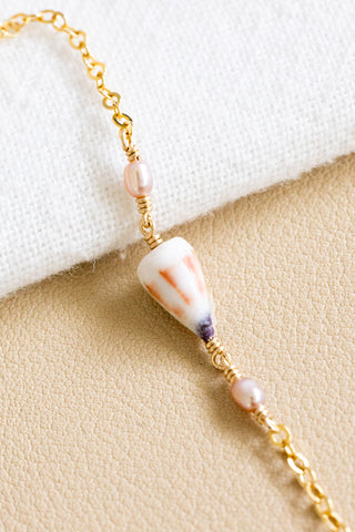Brown/Indigo Dwarf Cone & Mini Light Pink Rice Pearl Bracelet