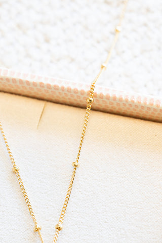 Stamped Plumeria & Peach Keshi Edison Pearl Dainty Beam Necklace
